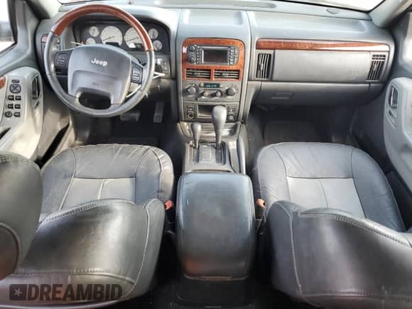 2004 Jeep Grand Cherokee Overland с VIN 1J8GW68J94C142762, выставлен на аукционе Copart как лот 71984385 с пробегом 192 727 миль миль и Списание • Salvage title. История ставок и продаж доступна на DreamBid. Изображение 8.