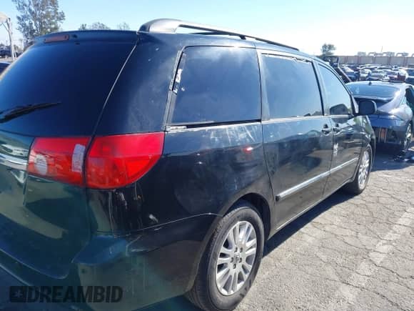 2009 Toyota Sienna XLE z VIN 5TDZK22C69S273555, wystawiony jako IAAI lot #41276221 z przebiegiem 129 160 mil mil oraz . Historia ofert i sprzedaży dostępna na DreamBid. Obrazek 4.