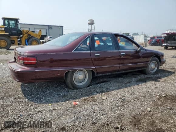 1991 Chevrolet Caprice с VIN 1G1BN53E6MR107403, выставлен на аукционе Copart как лот 67186345 с пробегом 80 982 миль миль и Списание • Salvage title. История ставок и продаж доступна на DreamBid. Изображение 3.