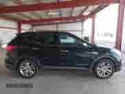 2014 Hyundai Santa Fe z VIN 5XYZU3LA6EG177655, wystawiony jako IAAI lot #43464543 z przebiegiem 117 687 mil mil oraz . Historia ofert i sprzedaży dostępna na DreamBid. Obrazek 13.