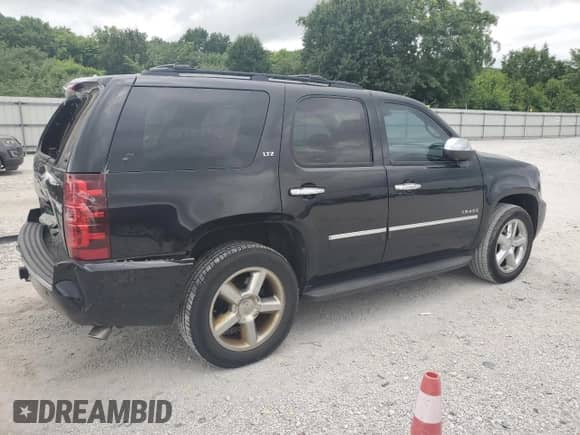 2013 Chevrolet Tahoe LTZ с VIN 1GNSCCE03DR341766, выставлен на аукционе Copart как лот 63620855 с пробегом 214 701 миль миль и Чистый • Clean title. История ставок и продаж доступна на DreamBid. Изображение 3.