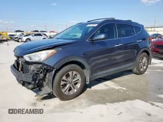 2015 Hyundai Santa Fe с VIN 5XYZU3LB1FG275731, выставлен на аукционе Copart как лот 69977695 с пробегом Не указан миль и Списание • Salvage title. История ставок и продаж доступна на DreamBid. Изображение 1.