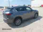 2023 Mazda CX-5 S Preferred z VIN JM3KFBCM3P0183039, wystawiony jako IAAI lot #42671736 z przebiegiem 73 559 mil mil oraz . Historia ofert i sprzedaży dostępna na DreamBid. Obrazek 4.