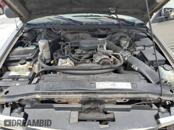 2000 Chevrolet Blazer LS z VIN 1GNCS13W2Y2395156, wystawiony jako Copart lot #65617525 z przebiegiem 140 108 mil mil oraz Szkoda całkowita • Salvage title. Historia ofert i sprzedaży dostępna na DreamBid. Obrazek 12.