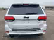 2015 Jeep Grand Cherokee SRT with VIN 1C4RJFDJ4FC882940, listed as a IAAI auction lot 43549108 with 18,901 mi miles and . Bid and sale history available at DreamBid. Image 16.