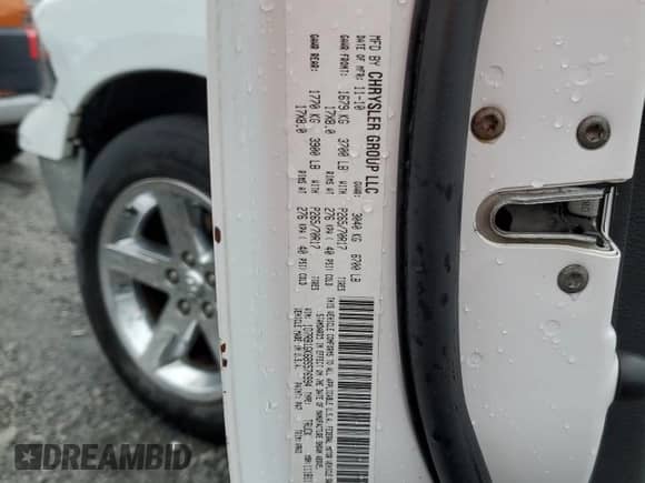 2011 Ram 1500 ST with VIN 1D7RB1GK6BS576994, listed as a Copart auction lot 54678095 with 166,336 mi miles and Salvage title. Bid and sale history available at DreamBid. Image 12.