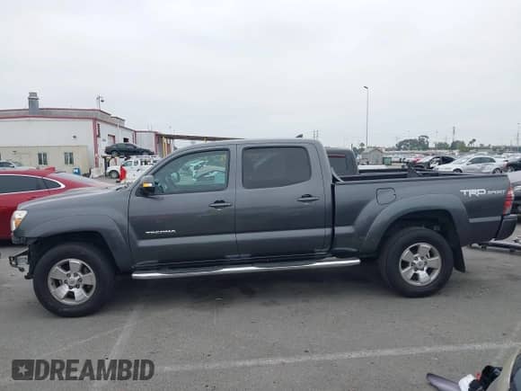 2014 Toyota Tacoma PreRunner with VIN 3TMKU4HN9EM041509, listed as a IAAI auction lot 42441194 with 290,715 mi miles and . Bid and sale history available at DreamBid. Image 15.
