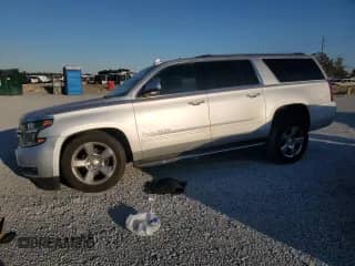 2020 Chevrolet Suburban Premier z VIN 1GNSCJKC9LR198484, wystawiony jako Copart lot #87354514 z przebiegiem 115 008 mil mil oraz Szkoda całkowita • Salvage title. Historia ofert i sprzedaży dostępna na DreamBid. Obrazek 1.