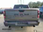 2023 Ram 1500 Rebel with VIN 1C6SRFLT8PN590542, listed as a Copart auction lot 70011115 with 27,609 mi miles and Salvage title. Bid and sale history available at DreamBid. Image 6.