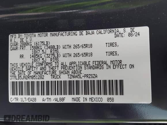 2024 Toyota Tacoma SR5 z VIN 3TMLB5JN2RM051282, wystawiony jako IAAI lot #42370502 z przebiegiem 3 932 mil mil oraz . Historia ofert i sprzedaży dostępna na DreamBid. Obrazek 9.