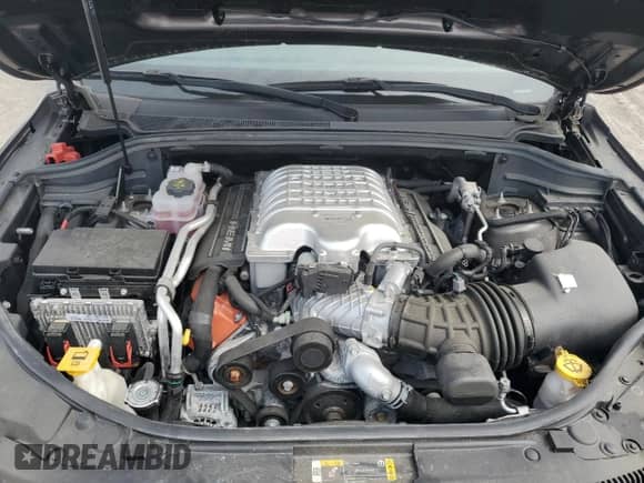 2021 Jeep Grand Cherokee Trackhawk z VIN 1C4RJFN9XMC842590, wystawiony jako Copart lot #58336885 z przebiegiem Nie podano mil oraz Szkoda całkowita • Salvage title. Historia ofert i sprzedaży dostępna na DreamBid. Obrazek 12.