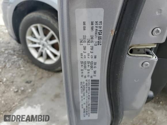 2018 Dodge Journey SXT z VIN 3C4PDDBG6JT450485, wystawiony jako Copart lot #55322215 z przebiegiem 114 672 mil mil oraz Szkoda całkowita • Salvage title. Historia ofert i sprzedaży dostępna na DreamBid. Obrazek 13.