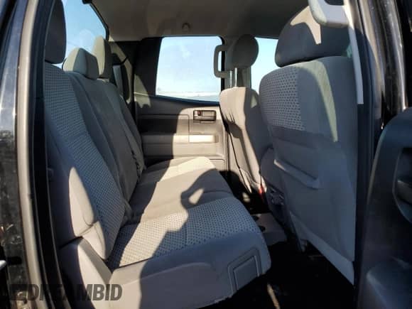 2012 Toyota Tundra z VIN 5TFRU5F12CX028127, wystawiony jako Copart lot #70646655 z przebiegiem 207 809 mil mil oraz Czysty tytuł • Clean title. Historia ofert i sprzedaży dostępna na DreamBid. Obrazek 10.
