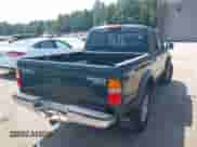 2003 Toyota Tacoma z VIN 5TEHN72NX3Z272243, wystawiony jako IAAI lot #42945576 z przebiegiem 147 818 mil mil oraz . Historia ofert i sprzedaży dostępna na DreamBid. Obrazek 4.