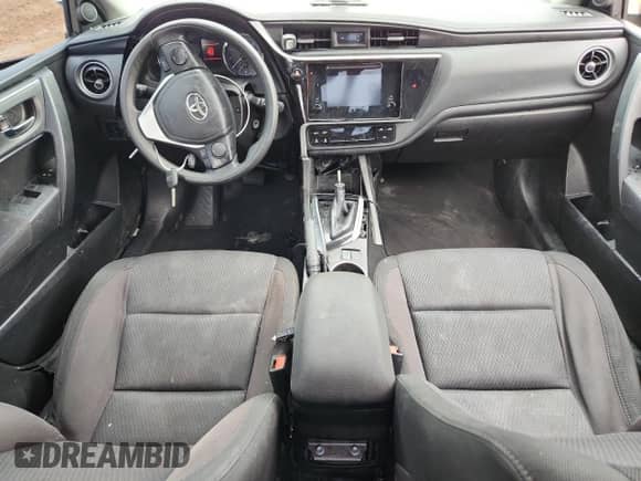 2019 Toyota Corolla L with VIN 5YFBURHE6KP861838, listed as a Copart auction lot 82158725 with 124,111 mi miles and Salvage title. Bid and sale history available at DreamBid. Image 8.