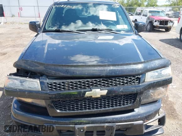 2011 Chevrolet Colorado 1LT z VIN 1GCHTCFE7B8136127, wystawiony jako IAAI lot #43083805 z przebiegiem 130 785 mil mil oraz . Historia ofert i sprzedaży dostępna na DreamBid. Obrazek 6.