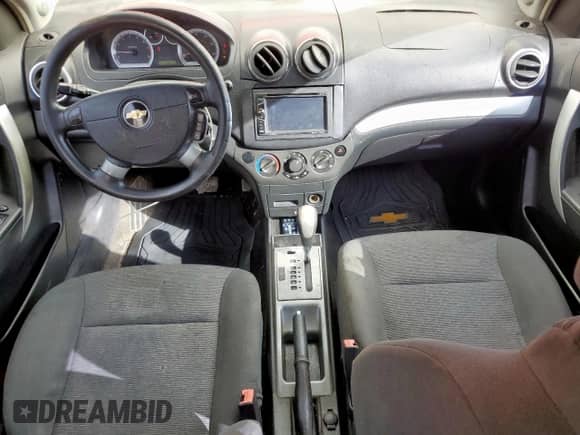 2011 Chevrolet Aveo 2LT с VIN KL1TG5DEXBB129745, выставлен на аукционе Copart как лот 82353045 с пробегом 96 515 миль миль и Списание • Salvage title. История ставок и продаж доступна на DreamBid. Изображение 8.