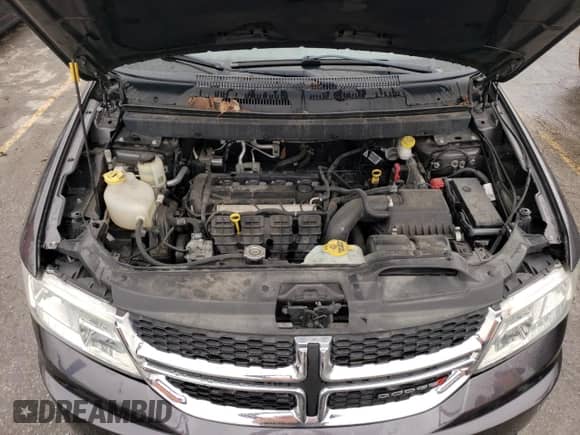 2018 Dodge Journey SE с VIN 3C4PDCAB1JT319657, выставлен на аукционе Copart как лот 76963503 с пробегом 90 154 миль миль и Списание • Salvage title. История ставок и продаж доступна на DreamBid. Изображение 12.