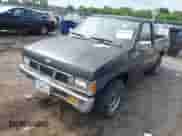 1994 Nissan Frontier with VIN 1N6SD11S2RC402971, listed as a IAAI auction lot 42388139 with 122,571 mi miles and . Bid and sale history available at DreamBid. Image 2.