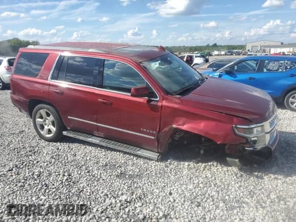 2016 Chevrolet Tahoe LT with VIN 1GNSCBKC8GR396601, listed as a Copart auction lot 84616655 with 131,971 mi miles and Salvage title. Bid and sale history available at DreamBid. Image 4.