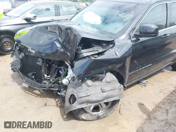 2017 Jeep Grand Cherokee Laredo z VIN 1C4RJFAG5HC808308, wystawiony jako IAAI lot #43023843 z przebiegiem 142 711 mil mil oraz . Historia ofert i sprzedaży dostępna na DreamBid. Obrazek 6.