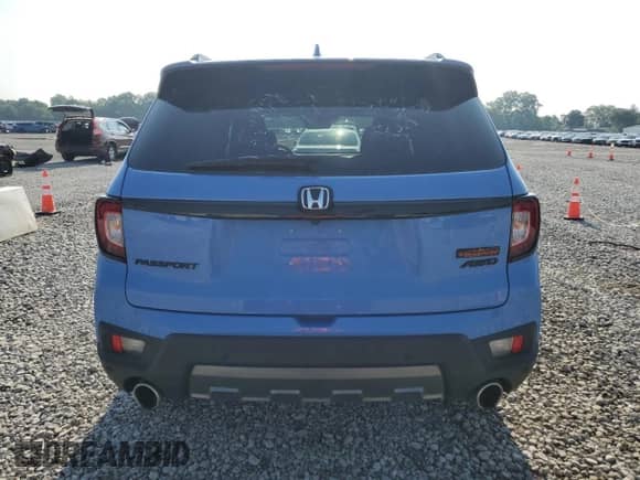 2024 Honda Passport TrailSport with VIN 5FNYF8H66RB012743, listed as a Copart auction lot 64032335 with 17,451 mi miles and Salvage title. Bid and sale history available at DreamBid. Image 6.