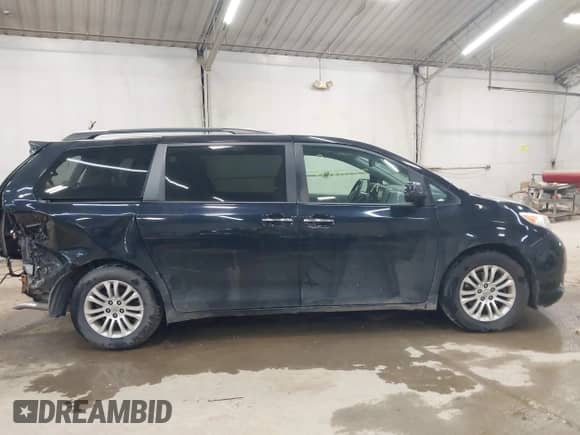 2016 Toyota Sienna XLE with VIN 5TDYK3DC0GS720490, listed as a IAAI auction lot 42790755 with 185,171 mi miles and . Bid and sale history available at DreamBid. Image 13.