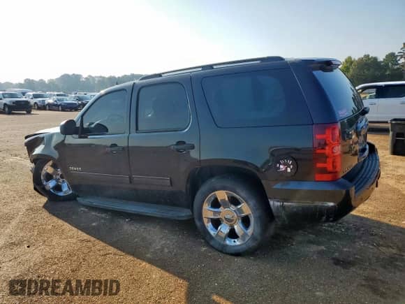 2010 Chevrolet Tahoe LS with VIN 1GNUCAE05AR266352, listed as a Copart auction lot 80311695 with 196,521 mi miles and Salvage title. Bid and sale history available at DreamBid. Image 2.
