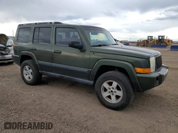 2007 Jeep Commander Sport z VIN 1J8HG48K47C527522, wystawiony jako Copart lot #71357285 z przebiegiem 193 879 mil mil oraz Szkoda całkowita • Salvage title. Historia ofert i sprzedaży dostępna na DreamBid. Obrazek 4.