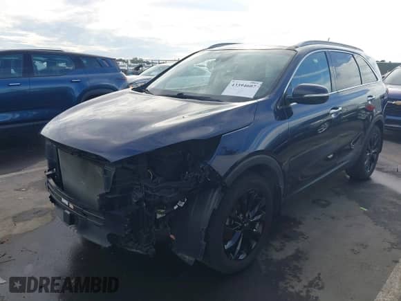2020 Kia Sorento EX z VIN 5XYPH4A57LG696248, wystawiony jako IAAI lot #43394607 z przebiegiem 49 194 mil mil oraz . Historia ofert i sprzedaży dostępna na DreamBid. Obrazek 2.