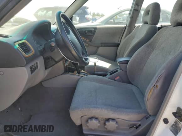 2001 Subaru Forester L with VIN JF1SF63521H714545, listed as a Copart auction lot 66736615 with 201,559 mi miles and Salvage title. Bid and sale history available at DreamBid. Image 7.