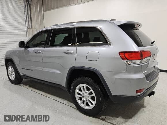 2020 Jeep Grand Cherokee Laredo E z VIN 1C4RJFAGXLC153684, wystawiony jako Copart lot #86517945 z przebiegiem 139 511 mil mil oraz Czysty tytuł • Clean title. Historia ofert i sprzedaży dostępna na DreamBid. Obrazek 2.