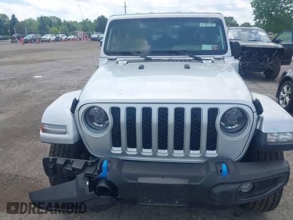 2023 Jeep Wrangler Sahara with VIN 1C4JJXP69PW695915, listed as a IAAI auction lot 42662028 with 36,957 mi miles and . Bid and sale history available at DreamBid. Image 12.