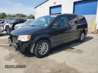 2016 Dodge Grand Caravan SXT with VIN 2C4RDGCGXGR339846, listed as a Copart auction lot 82103665 with 131,716 mi miles and Salvage title. Bid and sale history available at DreamBid. Image 1.
