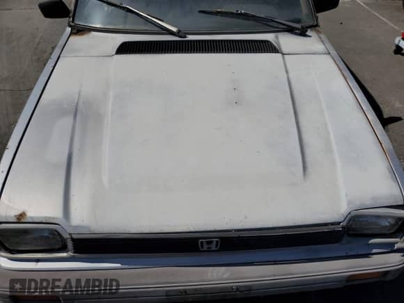 1983 Honda Civic z VIN JHMWD5526DS007016, wystawiony jako Copart lot #60973254 z przebiegiem 257 657 mil mil oraz Czysty tytuł • Clean title. Historia ofert i sprzedaży dostępna na DreamBid. Obrazek 11.