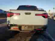 2025 Hyundai Santa Cruz SEL Activity z VIN 5NTJCDDE8SH149546, wystawiony jako Copart lot #90921035 z przebiegiem 396 mil mil oraz Szkoda całkowita • Salvage title. Historia ofert i sprzedaży dostępna na DreamBid. Obrazek 6.