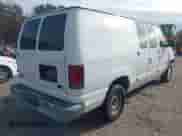 2002 Ford Econoline Cargo with VIN 1FTRE14252HB67887, listed as a IAAI auction lot 41180872 with 274,561 mi miles and . Bid and sale history available at DreamBid. Image 4.