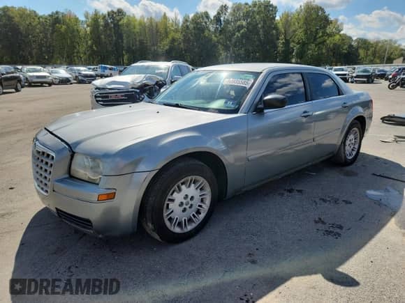 2006 Chrysler 300 with VIN 2C3KA43R36H152029, listed as a Copart auction lot 80935585 with 71,620 mi miles and Salvage title. Bid and sale history available at DreamBid. Image 1.