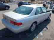 2001 Toyota Camry LE z VIN 4T1BF28K11U965240, wystawiony jako IAAI lot #42743490 z przebiegiem 165 542 mil mil oraz . Historia ofert i sprzedaży dostępna na DreamBid. Obrazek 4.