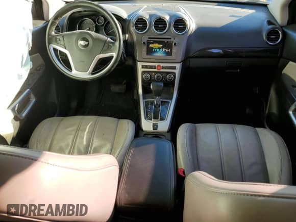 2014 Chevrolet Captiva Sport LTZ z VIN 3GNAL4EK6ES569410, wystawiony jako Copart lot #79771094 z przebiegiem 142 157 mil mil oraz Szkoda całkowita • Salvage title. Historia ofert i sprzedaży dostępna na DreamBid. Obrazek 8.