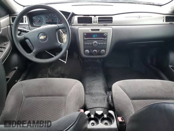 2015 Chevrolet Impala Police Police with VIN 2G1WD5E33F1132870, listed as a Copart auction lot 69433985 with 140,836 mi miles and Salvage title. Bid and sale history available at DreamBid. Image 8.