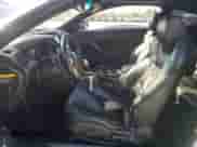 2013 Hyundai Genesis Coupe Track z VIN KMHHU6KJ1DU094187, wystawiony jako Copart lot #84583665 z przebiegiem 214 786 mil mil oraz Szkoda całkowita • Salvage title. Historia ofert i sprzedaży dostępna na DreamBid. Obrazek 7.