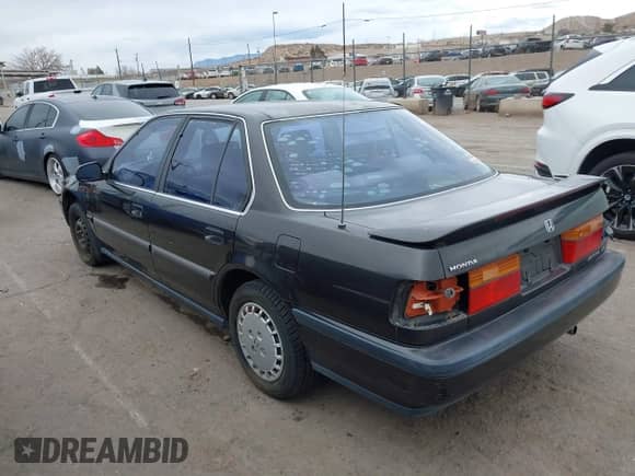 1991 Honda Accord LX z VIN JHMCB7653MC090847, wystawiony jako IAAI lot #41561641 z przebiegiem 163 258 mil mil oraz . Historia ofert i sprzedaży dostępna na DreamBid. Obrazek 3.