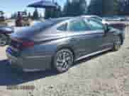 2020 Hyundai Sonata Blue с VIN KMHL24JJ9LA011997, выставлен на аукционе Copart как лот 61874095 с пробегом 72 389 миль миль и Списание • Salvage title. История ставок и продаж доступна на DreamBid. Изображение 3.