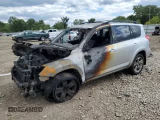 2011 Toyota RAV4 Sport with VIN JTMRF4DV7B5045736, listed as a Copart auction lot 70218955 with Not provided miles and Salvage title. Bid and sale history available at DreamBid. Image 1.