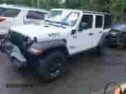 2023 Jeep Wrangler с VIN 1C4JJXN67PW630869, выставлен на аукционе IAAI как лот 42170206 с пробегом 56 384 миль миль и . История ставок и продаж доступна на DreamBid. Изображение 17.