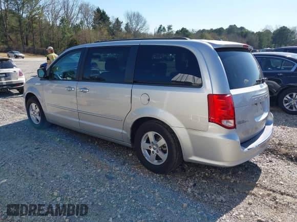 2011 Dodge Grand Caravan Mainstreet with VIN 2D4RN3DG0BR748230, listed as a IAAI auction lot 41890670 with 124,660 mi miles and . Bid and sale history available at DreamBid. Image 3.