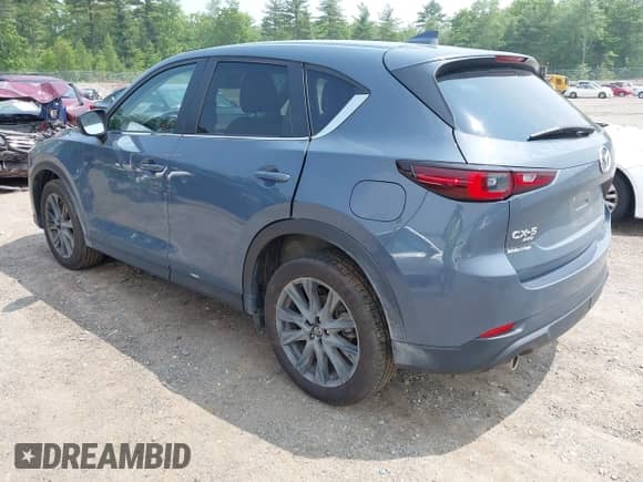 2023 Mazda CX-5 S Carbon Edition z VIN JM3KFBCM5P0179462, wystawiony jako IAAI lot #42451109 z przebiegiem 14 170 mil mil oraz . Historia ofert i sprzedaży dostępna na DreamBid. Obrazek 3.