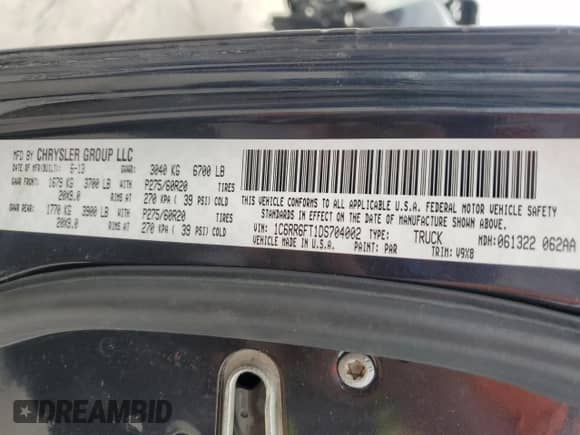 2013 Ram 1500 Tradesman z VIN 1C6RR6FT1DS704002, wystawiony jako Copart lot #53826905 z przebiegiem 145 215 mil mil oraz Szkoda całkowita • Salvage title. Historia ofert i sprzedaży dostępna na DreamBid. Obrazek 12.