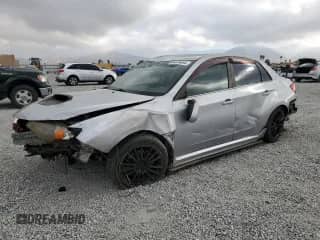 2012 Subaru WRX WRX with VIN JF1GV7E61CG028431, listed as a Copart auction lot 80004005 with 83,218 mi miles and Salvage title. Bid and sale history available at DreamBid. Image 1.